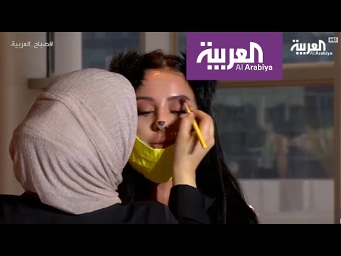 الكويتية حنان النجادة تحوِّل عارضة إلى أسد باستخدام كمام طبي